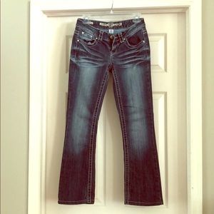 Boot cut jeans with decorated pockets